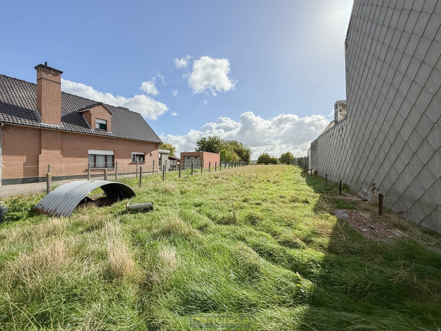 Te koop, rustig gelegen perceel voor halfopen bebouwing in de glooiende omgeving van Brakel - foto 4