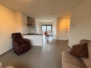 Moderne, lichtrijke en energiezuinige assistentiewoning met 1 slaapkamer en zonnig zuidterrasDeze recente en energiezuinige assistentiewoning (63 m²)...