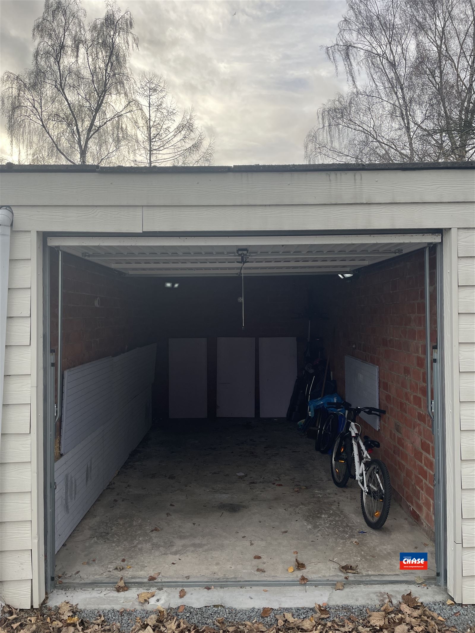Garage box met nieuwe poort - foto 4