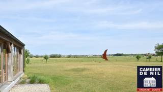 Unieke eigendom met verzichten op de velden. Gebouwd met architect driesmans met oog voor detail. indeling : inkomhal, toilet, living met...