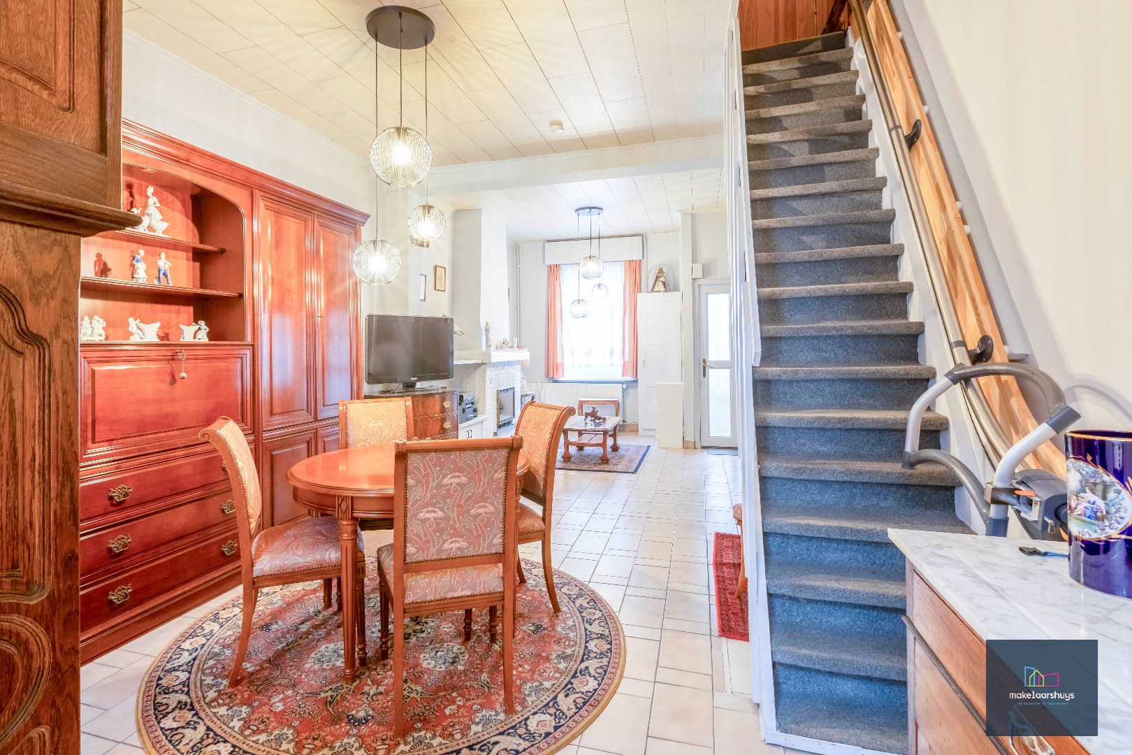 Charmante op te frissen rijwoning met ruime stadstuin - foto 5