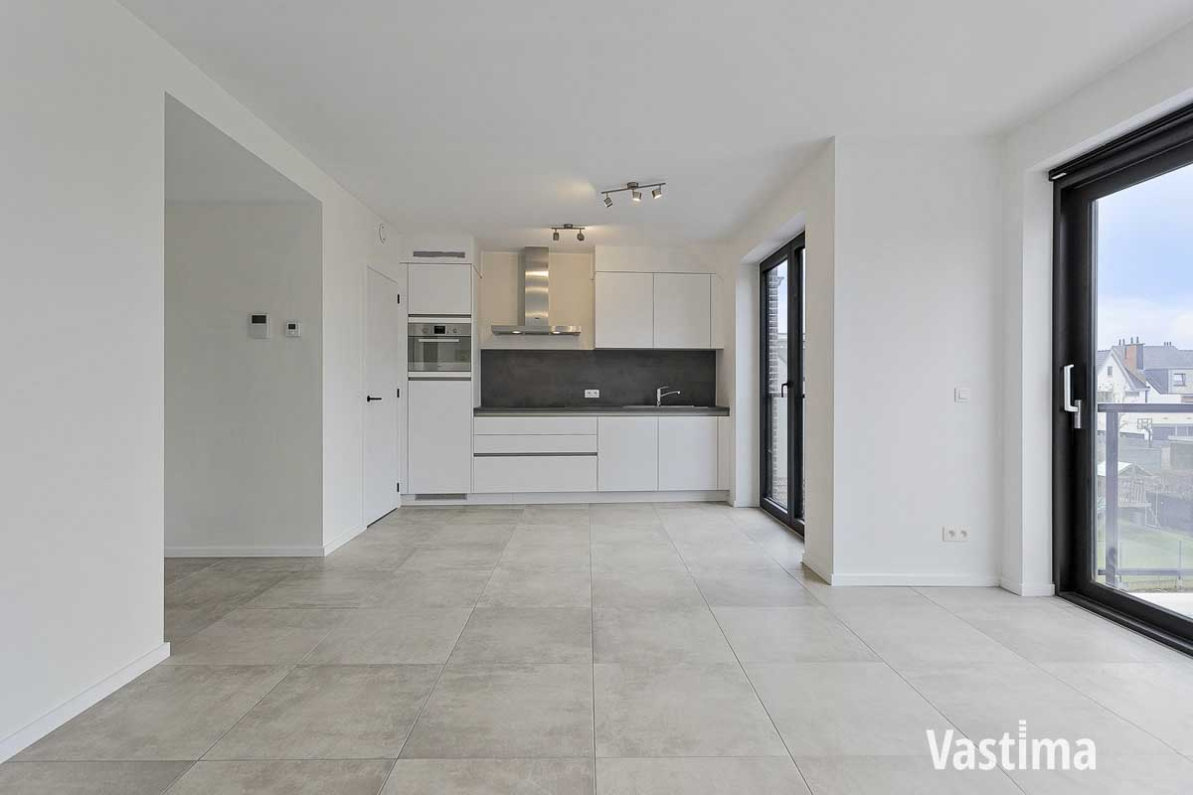Recent appartement met 2 slaapkamers, terras, lift en garage - photo 4