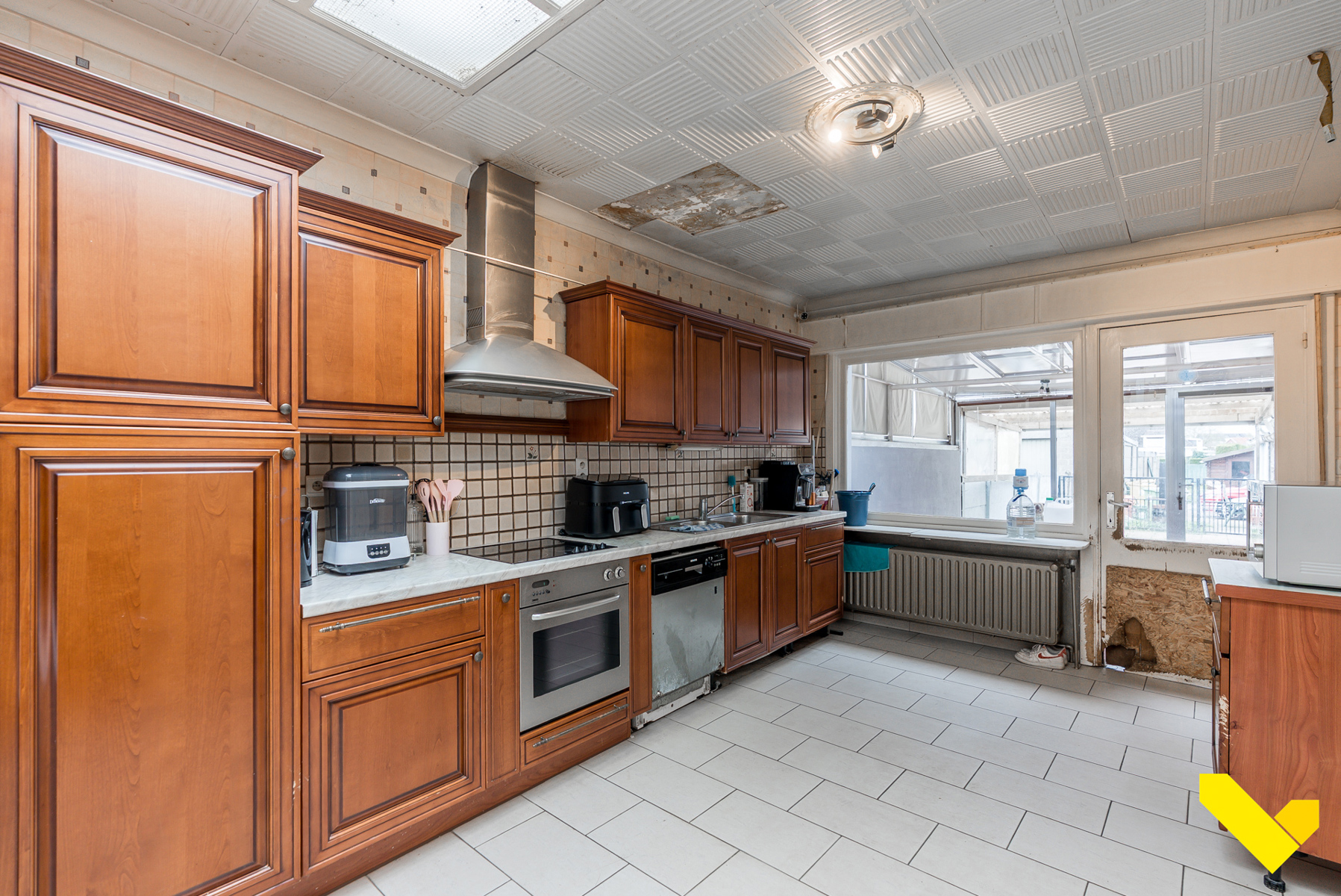 Verder te renoveren woning in het centrum van Veerle. - foto 5