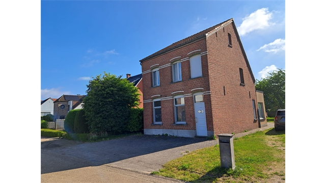 Een vrijstaande woning met ruime tuin en garage nabij het centrum van Vlimmeren - foto 1