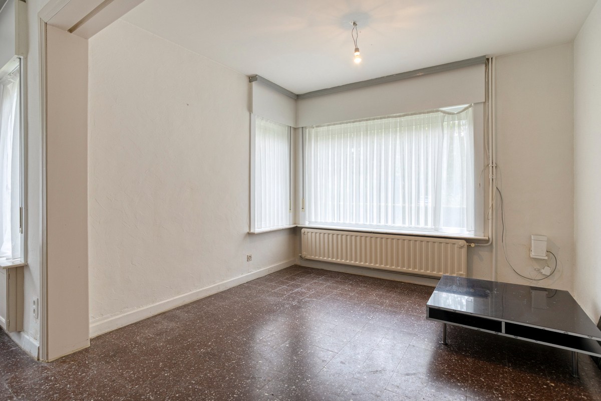 Op te frissen gelijkvloerse woning met 1 slaapkamer en garage! - foto 4