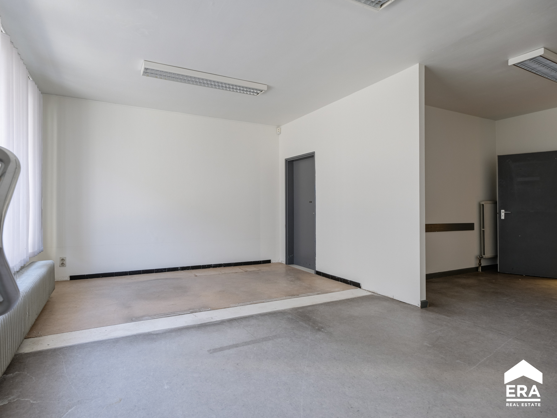 Gelijkvloers appartement in centrum Neerpelt - foto 2