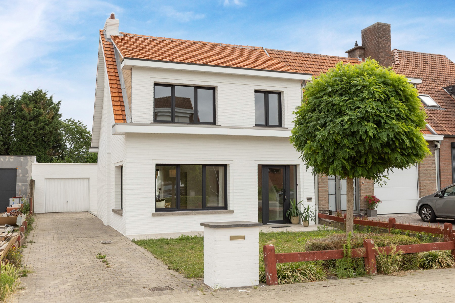 Instapklare woning met zonnige tuin op uitstekende ligging - foto 1