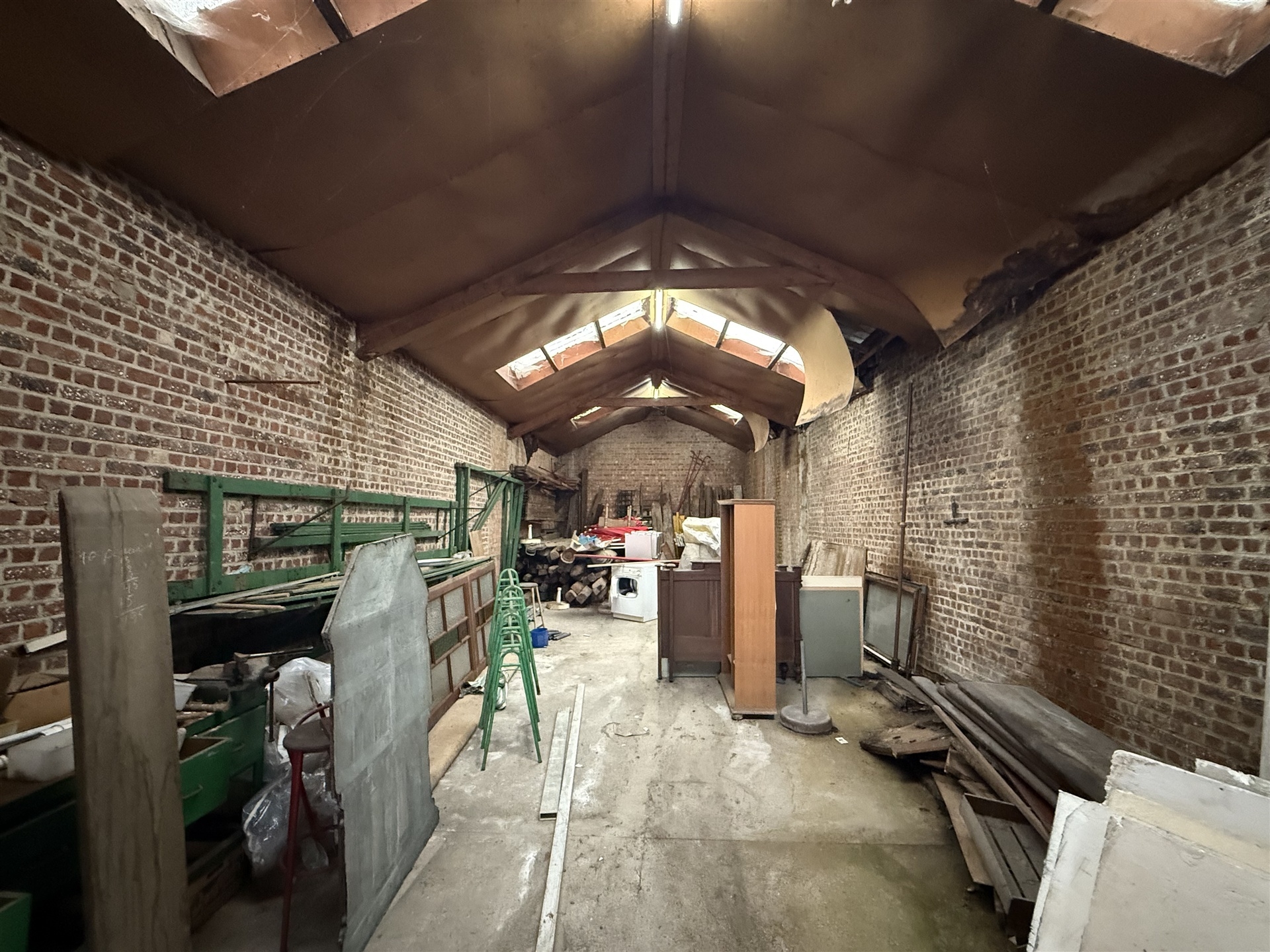 Ruime bergplaats met ontwikkelingspotentieel in het centrum van Merchtem - foto 3