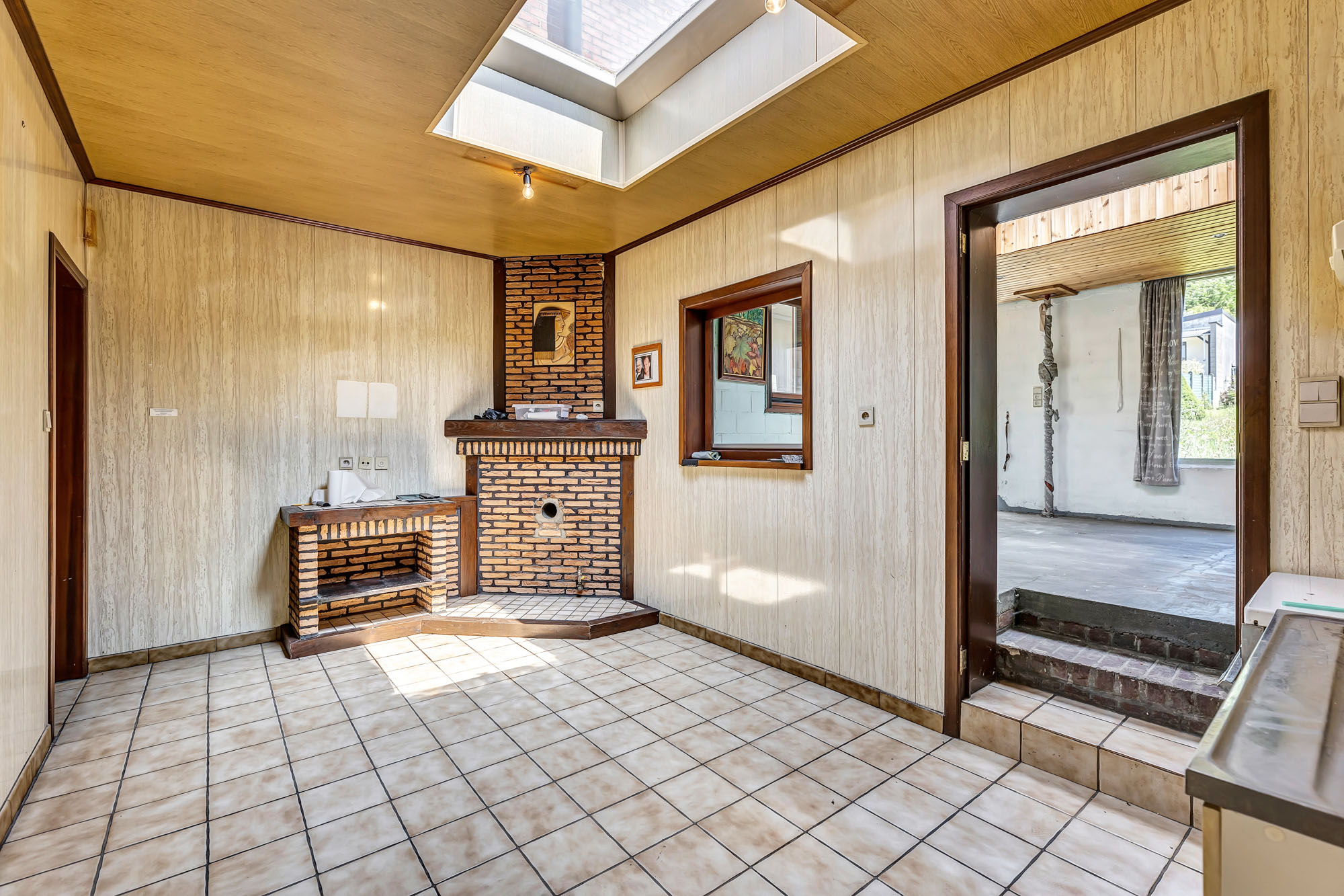 Te renoveren woning met garage en tuin - foto 4