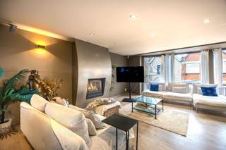 Smaakvolle bel-étagewoning met 5 slaapkamers en mooie zuidgerichte terrassen met open zicht, aangenaam gelegen op 500 meter van de zeedijk van Heist...