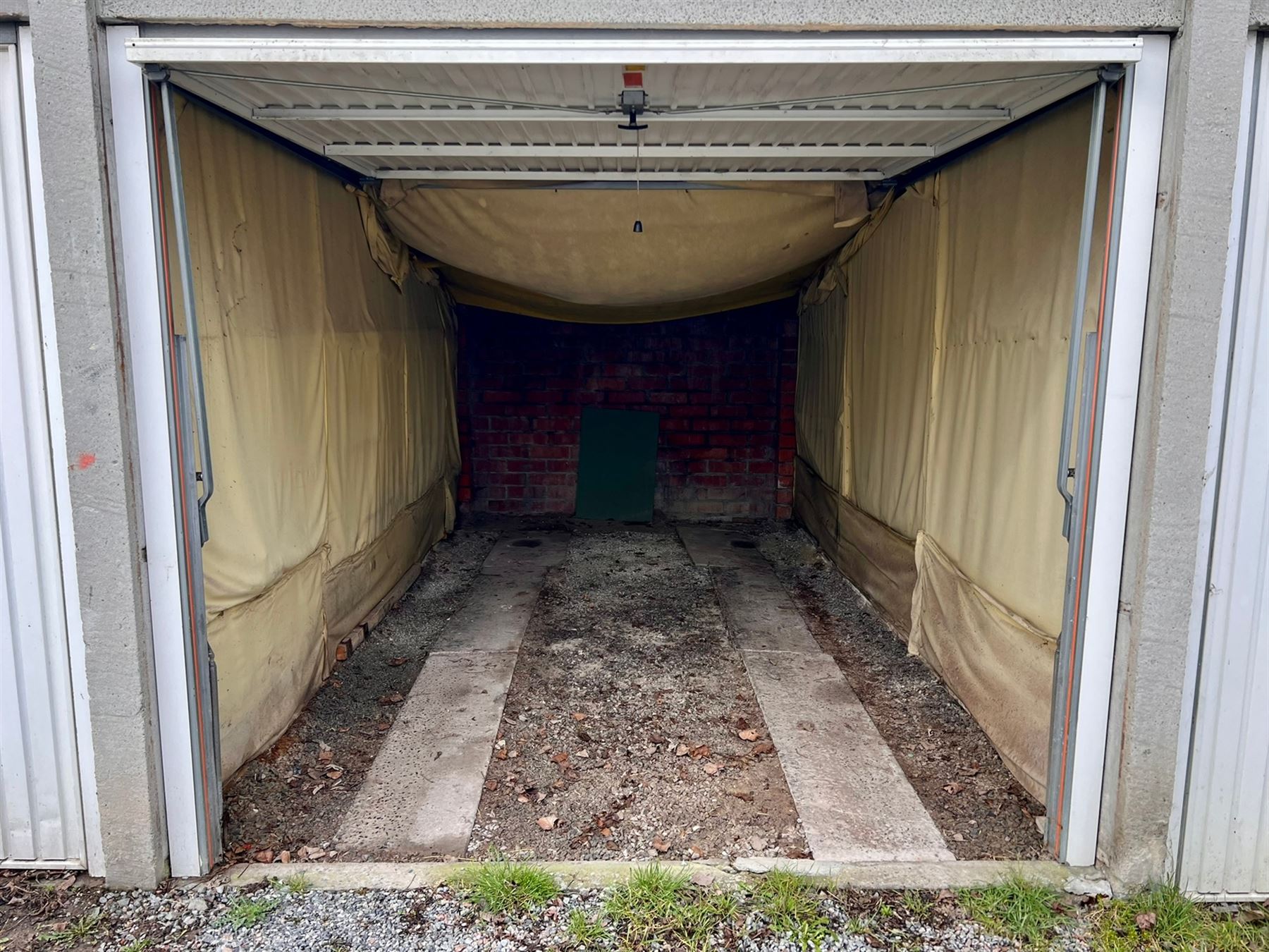 Ideale investering bouwgrond met 20 achterliggende garageboxen - foto 5