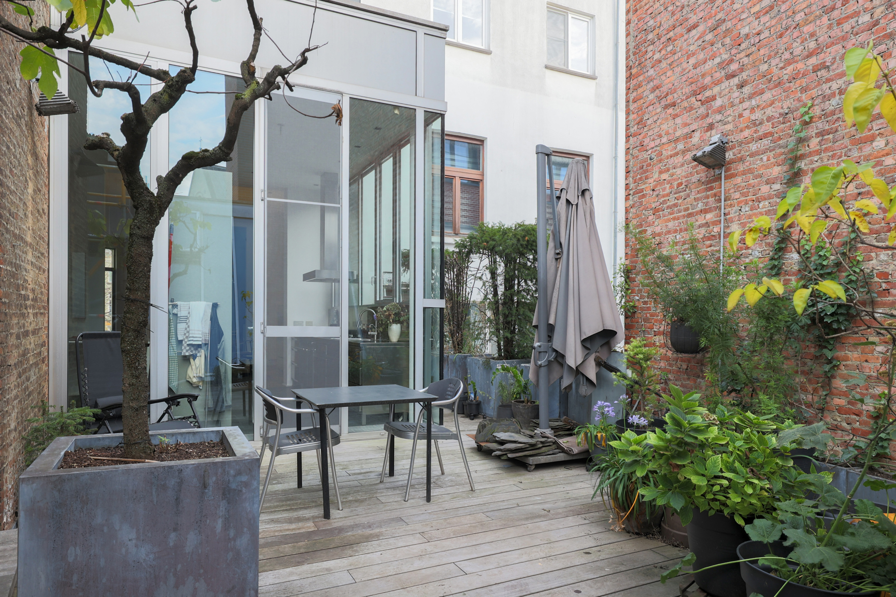 Triplex met stadsallure & buitenruimte aan het Mechelseplein - foto 4