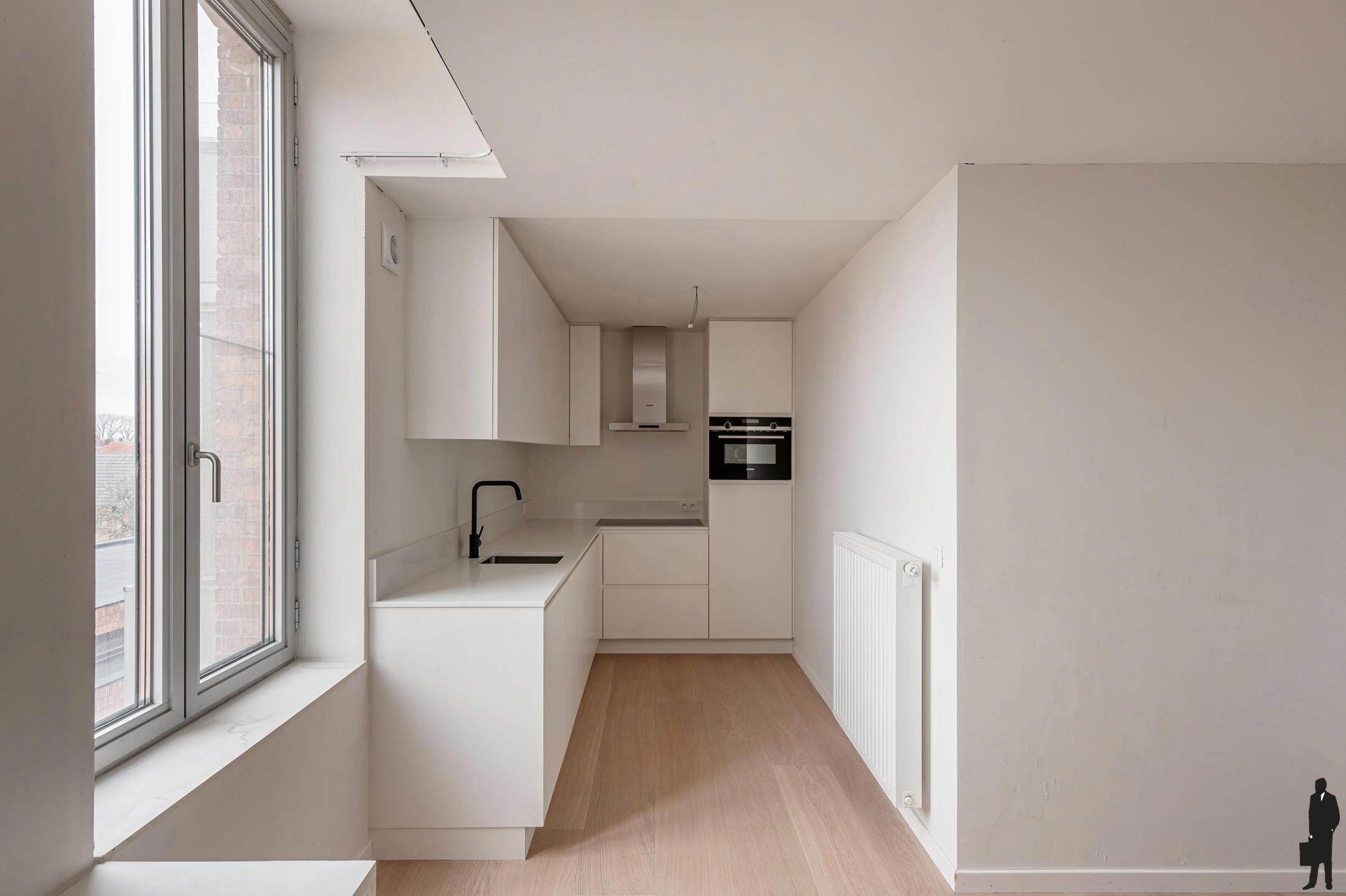 Charmante gerenoveerde duplex met 2 slaapkamers - foto 3