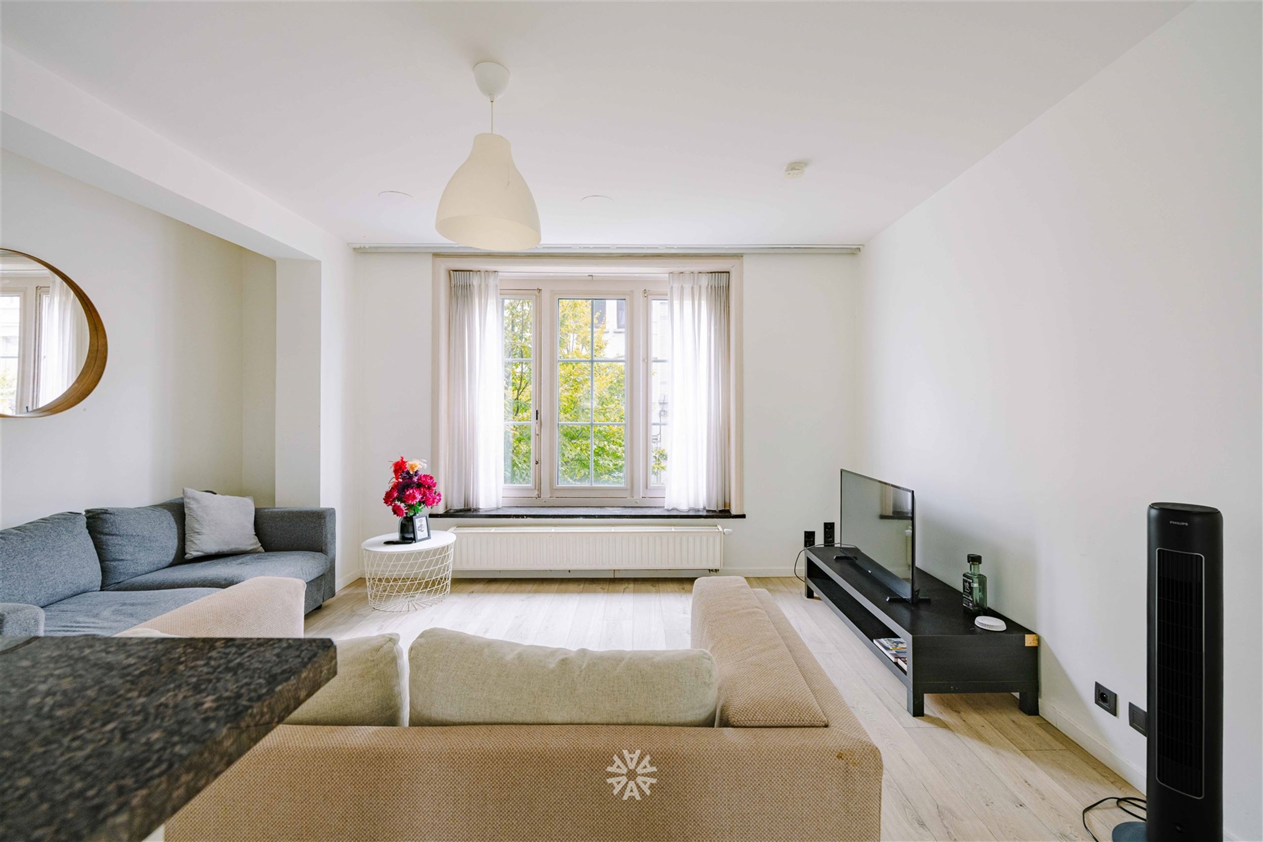 Centraal gelegen opbrengsteigendom met 8 entiteiten en parking - foto 2