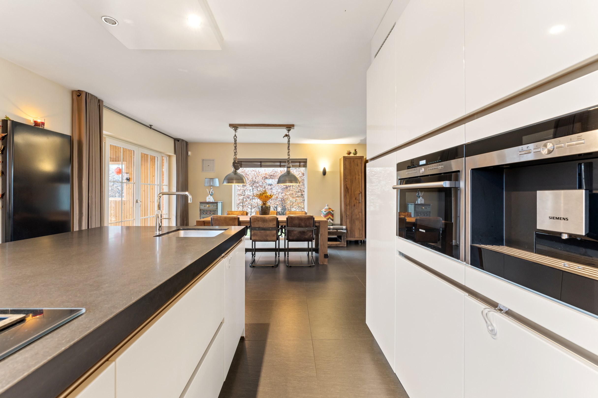 Hoogwaardig afgewerkte woning te Meerle op een perceel van ca. 908 m² - foto 2