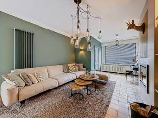 Instapklare woning nabij het centrum bestaande uit een inkomhal, gezellige leefruimte met eet-en zithoek, polyvalente ruimte, uitgeruste...