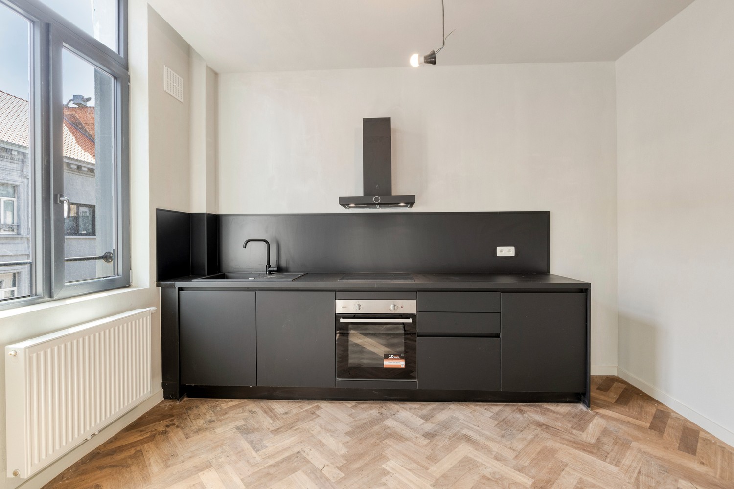 Gerenoveerd 2-slaapkamerappartement met terras in hartje Antwerpen - foto 1