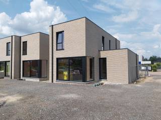 VERKOOP AAN 6% BTW mogelijk onder voorwaarden !Nieuwbouwproject van 5 ruime, moderne woningen met plat dak nabij het Centrum van Mol.Deze woningen...