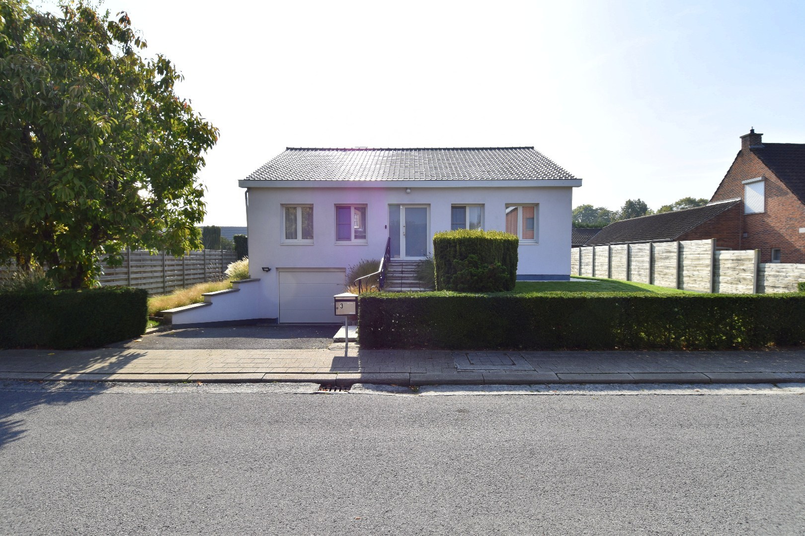 Vrijstaande woning met 3 slaapkamers, garage en tuin te koop in Wevelgem - foto 1