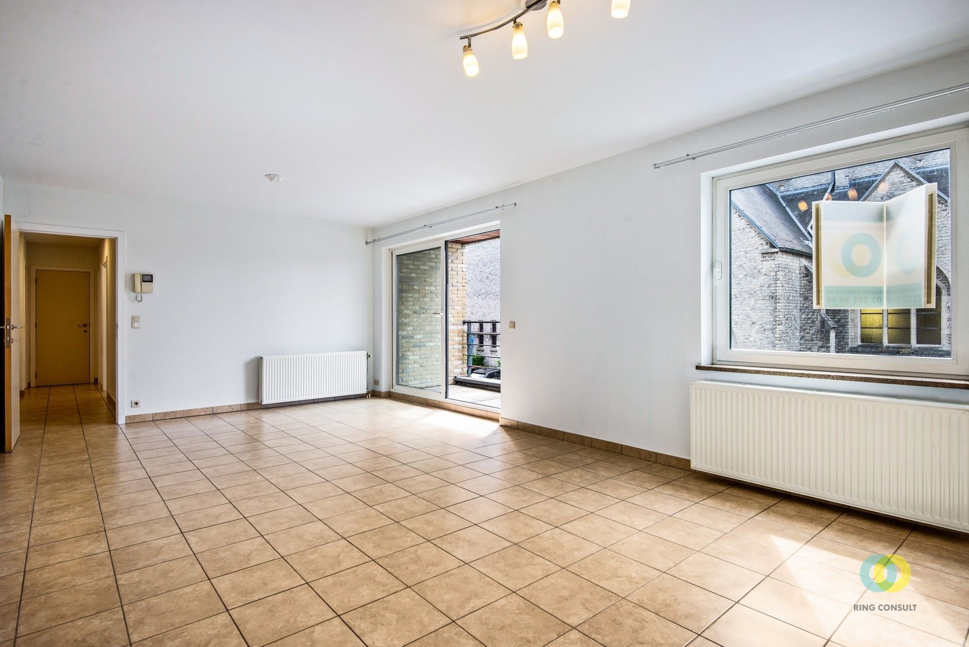 Appartement met twee slaapkamers en binnestaanplaats - foto 5