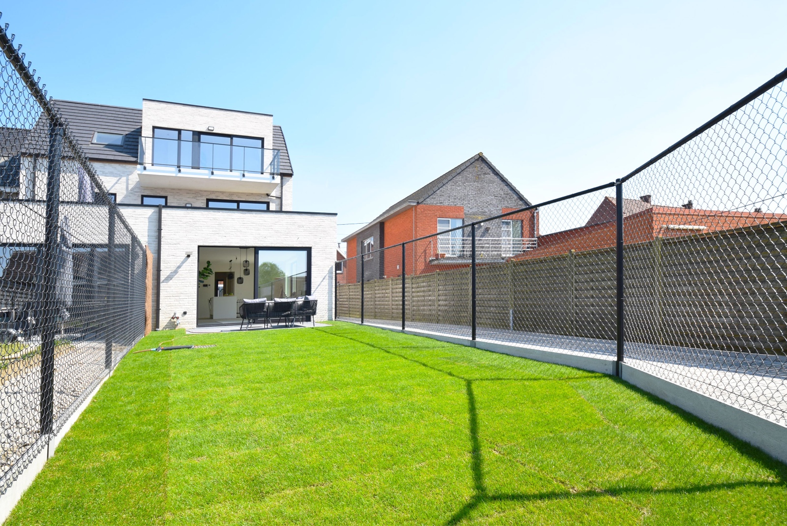 Gelijkvloers tweeslaapkamerappartement met zongerichte tuin - foto 4