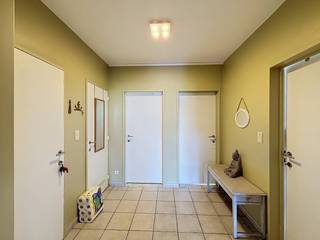 This apartment for rent is centrally located in Stabroek on the Lijsterbeslaan near all important facilities, but in a very quiet and child-friendly street. <br /><br />The apartment that we offer for rent is located in a small building and has the following layout: <br />- spacious entrance hall <br />- bright, spacious living room<br />- open, equipped kitchen with all modern comforts<br />- 2 separate storage rooms, one with a washer/dryer connection<br />- two full bedrooms <br />- bathroom with bath/shower and double washbasin furniture <br />- sunny terrace <br /><br />The apartment also has a parking space in a garage available! <br /><br />Details: <br />- EPC:??? kWh/m²<br />- monthly commission: €80/month <br />- parking space included! <br />- very quiet yet central neighborhood <br /><br /><br />Are you interested in renting this spacious apartment in Stabroek? Don't hesitate to contact us. Kapellen's Dewaele real estate office at Hoevensebaan 25 is happy to be at your service.