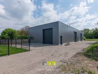 NIEUWBOUW BEDRIJFSHAL (470M²) OP 15A29CA TE MAASMECHELEN.KENMERKEN- 3 Automatische sectionaalpoorten (4,00m x 4,50m).- 3 Loopdeuren.- 1 Glazen...