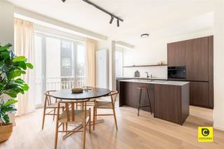 <p><span>Stylishly renovated 2-bedroom apartment with sunny terrace in Berchem - Harmonie</span></p><p><span>Discover this beautifully renovated 95 m² apartment with a spacious terrace of 10 m² at the rear, located in a well-maintained building in Berchem. Thanks to the thoughtful renovation with quality materials, abundant light and an energy efficient EPC label B, this apartment offers a perfect balance between comfort, style and sustainability.</span></p><p><span> </span></p><p><span>Berchem has been one of Antwerp's most popular residential neighborhoods for years, and that is no coincidence. The neighborhood around Harmonie combines trendy restaurants and local stores with green spaces such as the nearby Albert Park. Thanks to the easy connections, you can be both on the Antwerp Ring Road and in the city center in minutes. Public transportation, schools and other amenities are within walking distance, which makes this location particularly attractive for those who want urban living without sacrificing tranquility and accessibility.</span></p><p><span> </span></p><p><span>Layout</span></p><p><span>Upon entering, you enter a pleasant entrance hall with security door, which immediately sets the tone for the rest of the apartment: a combination of quality finishes and functional layout. The spacious living space enjoys sunlight throughout the morning thanks to the large windows that extend to the floor  which creates a wonderfully open and airy feeling. In spring and summer, the sunlight falls beautifully into the living room and kitchen, making this space even more enjoyable.</span></p><p><span>The open kitchen is a real eye-catcher, executed in high-quality materials with ceramic worktop, induction hob, dishwasher, refrigerator, combination oven and quality cabinets with a 10-year warranty. The kitchen appliances enjoy another 5-year warranty, further underlining the solidity of this renovation.</span></p><p><span> </span></p><p><span>Furthermore, there are two spacious bedrooms with lots of light and a separate storage room with plumbing for washing machine and dryer. The bathroom fits in perfectly with the natural elegance of the interior, with a stylish tiled floor that harmonizes with the oiled parquet floor in natural oak that runs seamlessly throughout the apartment.</span></p><p><span>From the bedrooms you have access to the sunny terrace of about 10 m² at the rear, where you can enjoy a lot of privacy and peaceful views  an ideal place to relax after a busy day.</span></p><p><span> </span></p><p><span>Additional assets</span></p><p><span>- Living space: 95 m² + 10 m² terrace</span></p><p><span>- Energy efficient EPC label B</span></p><p><span>- Basement storage included</span></p><p><span>- Security door and acoustic glazing</span></p><p><span>- High-end LED lighting with 5-year warranty included</span></p><p><span>- Complete renovation by Belgian contractor</span></p><p><span>- Private heating and water consumption included in common costs.</span></p><p><span>- Electricity conform AREI and asbestos free</span></p><p><span> </span></p><p><span>This apartment offers everything you would expect from a modern, energy-efficient home: quality finishes, abundant natural light, a quiet location and practical amenities such as a basement and bike storage. An ideal choice for those looking for ready-made comfort in the heart of Berchem.</span></p>