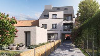 Aangenaam doorzonappartement met volgende indeling: inkomhal met vestiaire en gastentoilet, ruime berging, badkamer met inloopdouche, 3...