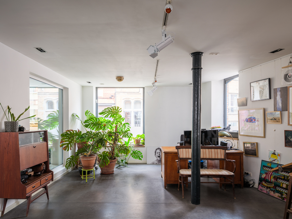 Bijzonder ruime duplex loft (263 m2 bvo) met buitenruimte, 3 slaapkamers, 2 badkamers en inpandige garage nabij de Vrijdagsmarkt. - foto 4