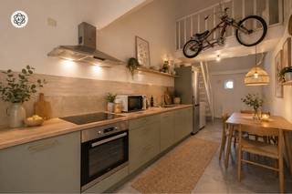 Te koop: vergunde opbrengsteigendom met een kantoor, 2 appartementen en groot magazijn in Ronse In de Olifantstraat in Ronse bevindt zich...