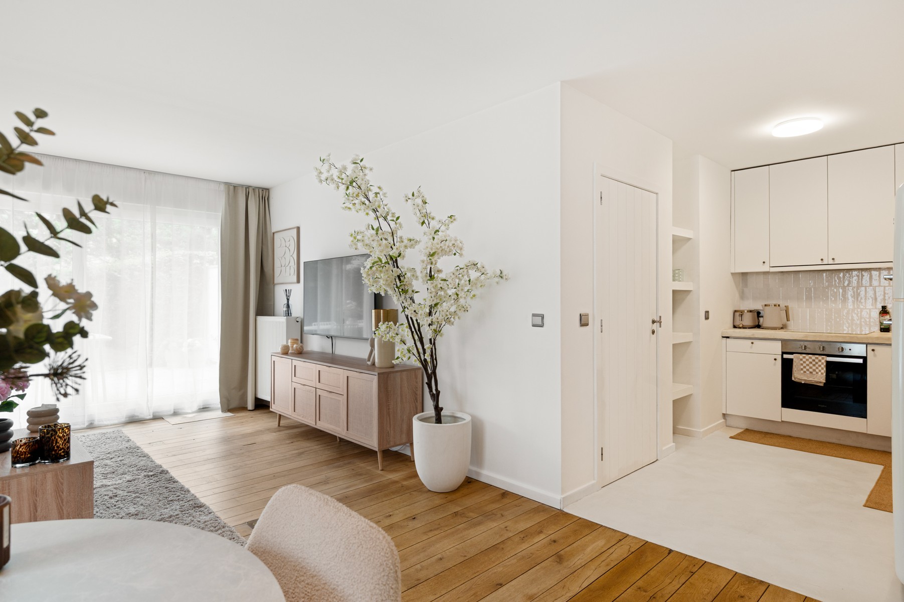 Gezellig gelijkvloers appartement met 2 slaapkamers, tuin en ondergrondse autostaanplaats nabij het centrum van Oelegem - foto 5