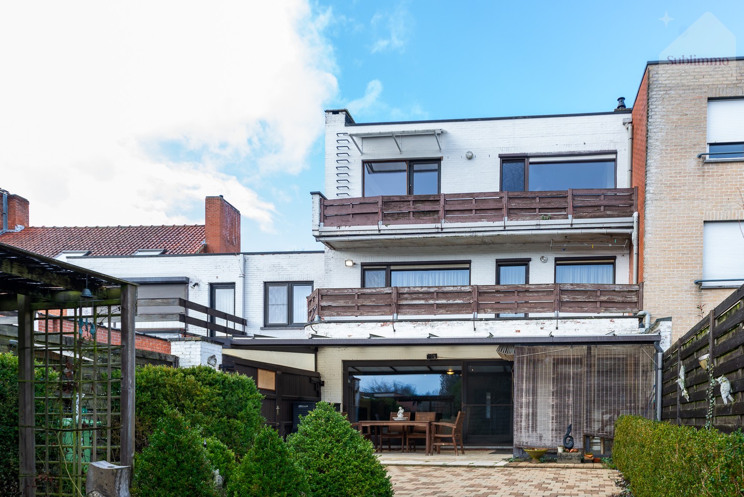 Opbrengsteigendom met 2 appartementen, tuin en garages te koop in Mol centrum - foto 2