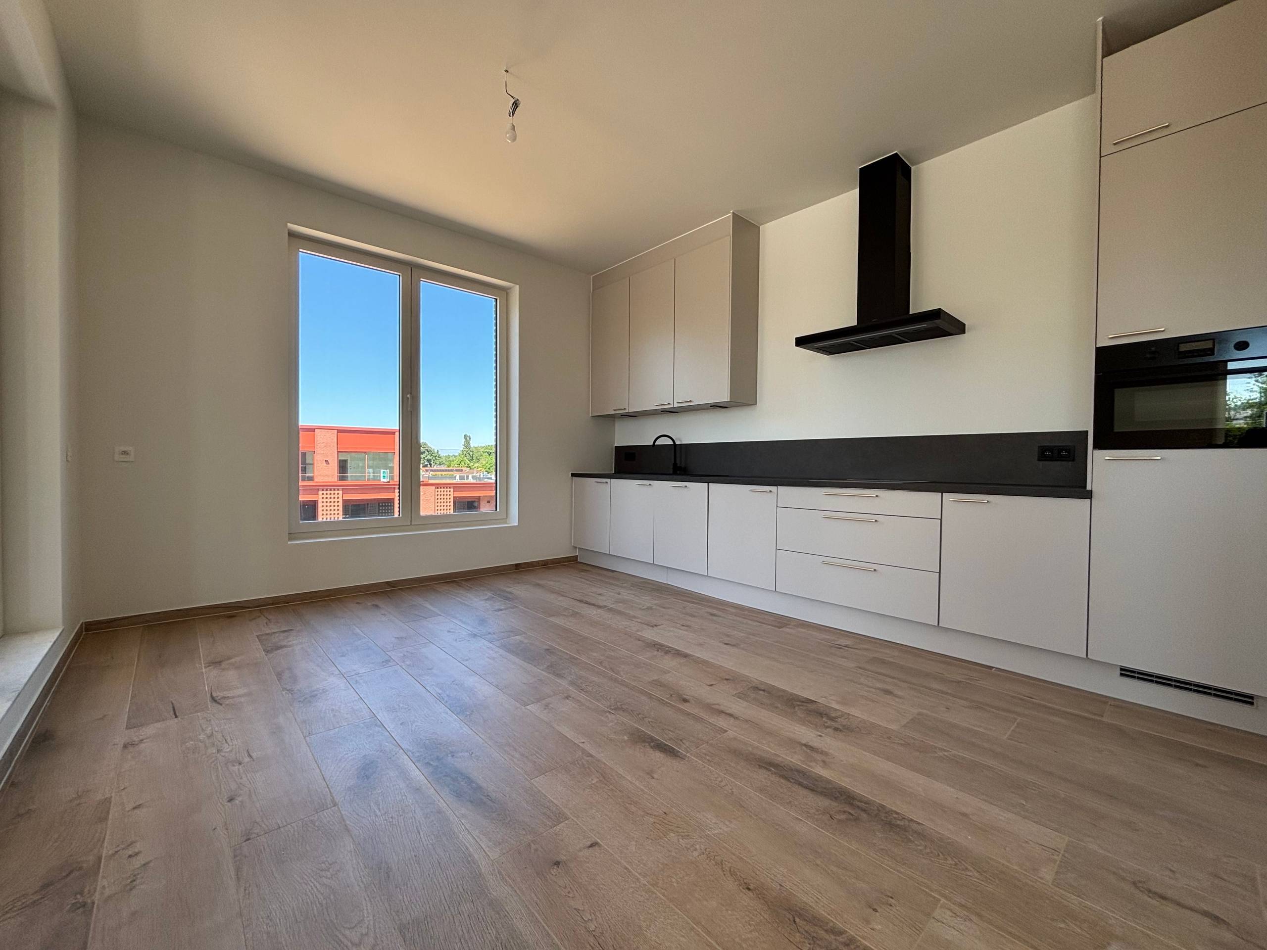 Lichtrijke penthouse met 2 slaapkamers in Sint-Lievens-Houtem - foto 2