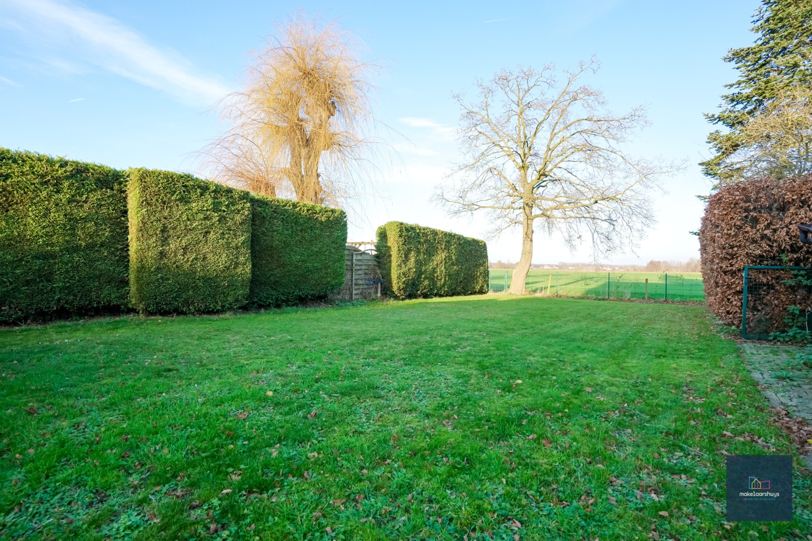 Ruime  halfopen bebouwing  met  zonnige tuin, terras en garage in Waarschoot - foto 4