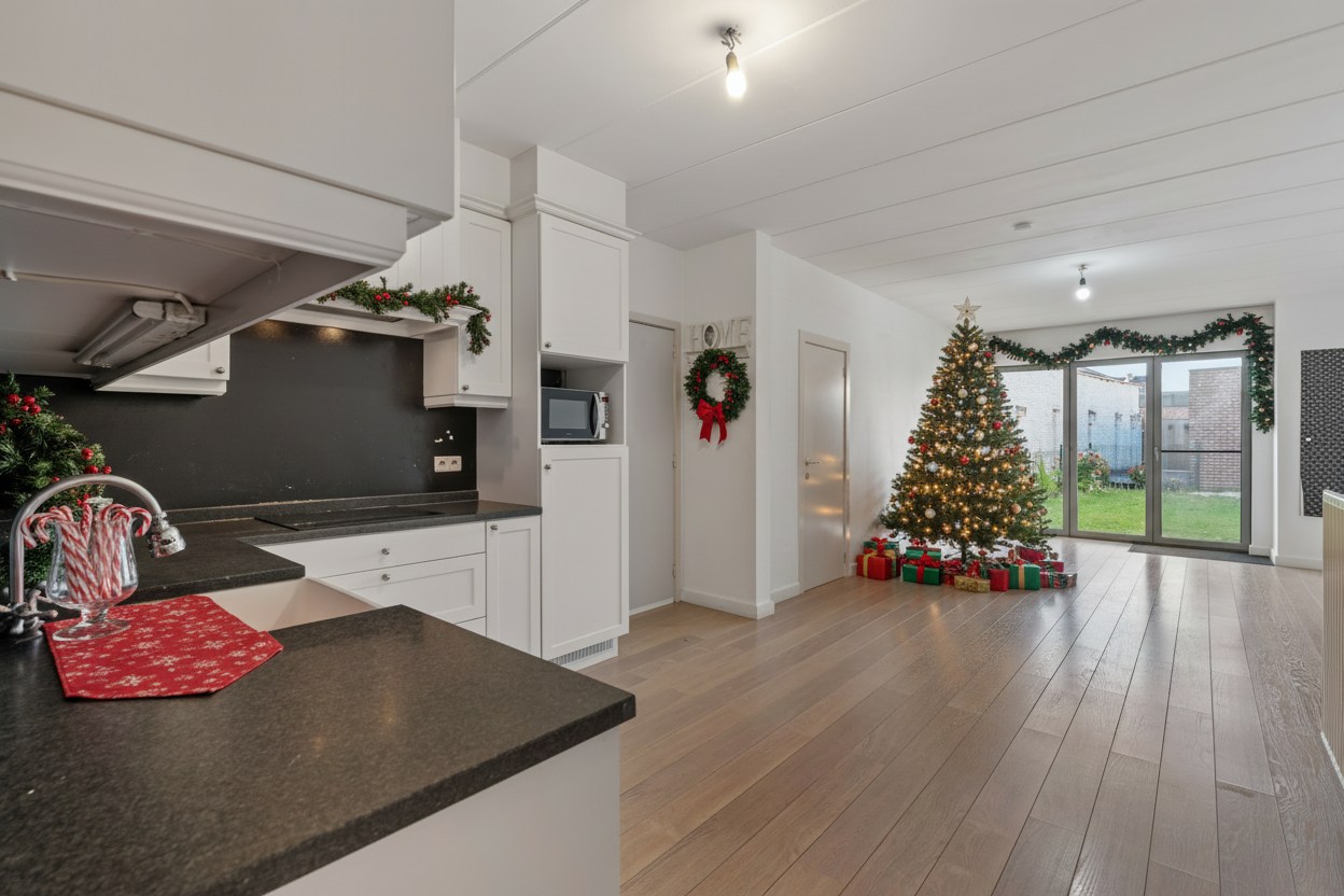 Gelijkvloers appartement met 1 à 2 slaapkamers, tuintje en garagebox - foto 1