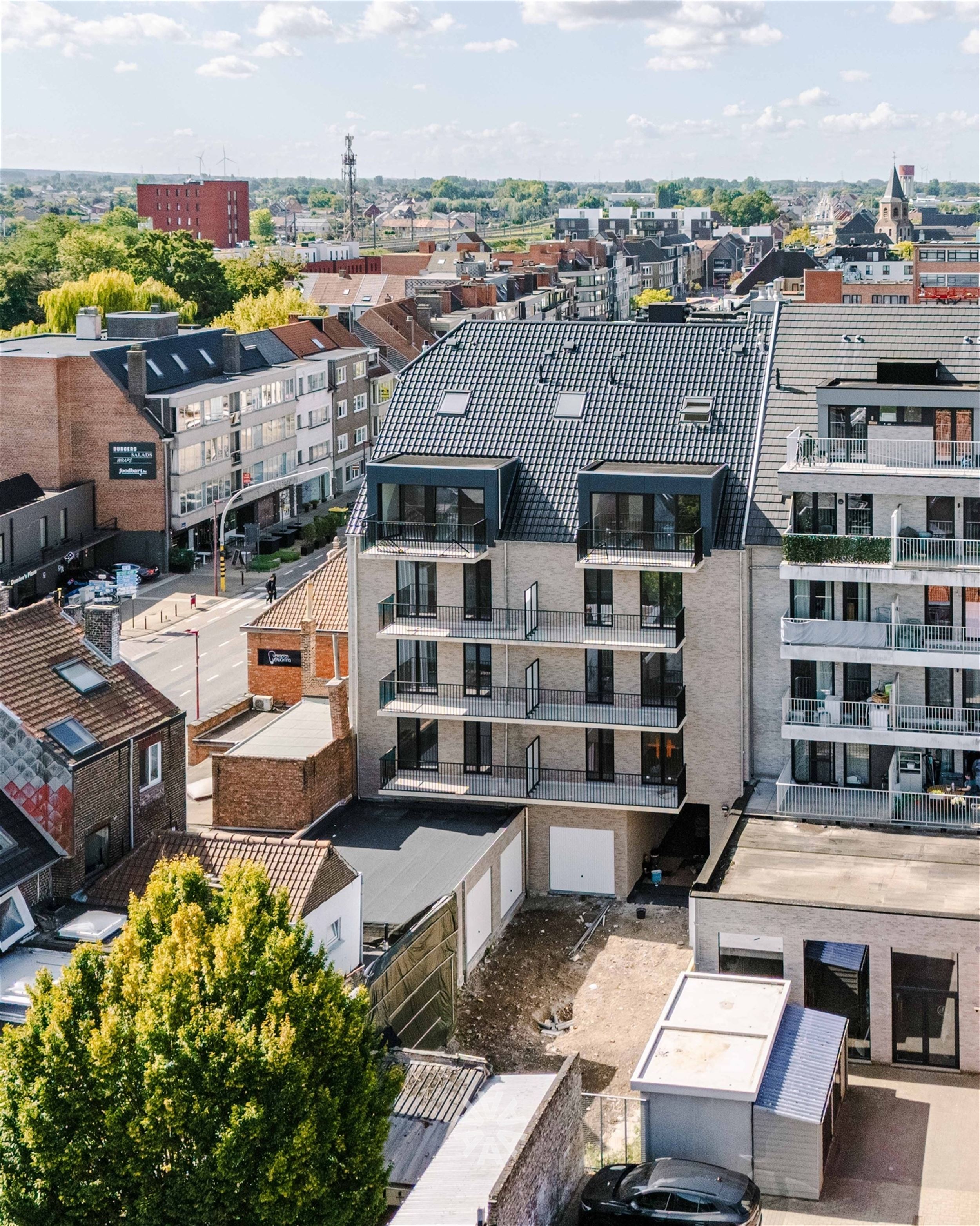 Nieuwbouwappartement te koop met 2 of 3 slaapkamers in een moderne residentie in het hartje van Deinze - foto 4