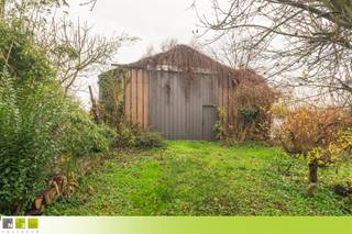 UNIEKE EIGENDOM BESTAANDE UIT EEN WONING MET EEN VERGUND MAGAZIJN VAN 215M² EN EEN NAASTGELEGEN RUIMTE VOOR INRIT/PARKING/BIJBOUW, GELEGEN OP...