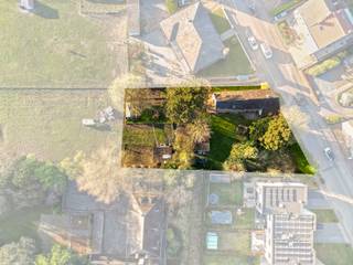 Projectgrond voor mogelijks 4 appartementen te Dilbeek gelegen in zone typologie 2. Mogelijkheid om de grond op te splitsen in 2 loten waar telkens...