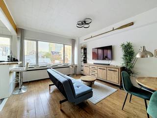 Looking for a ready-to-move-in studio to rent in Antwerp? This furnished studio is located on the fourth floor with an elevator in Dubois Street. Living in Antwerp here means enjoying the perfect balance between the dynamism of the Eilandje and the tranquillity of Park Spoor Noord. Thanks to its central location, public transport, shops and cozy restaurants are always within reach.<br /><br />Layout of apartment floor 4 with lift:<br /><br />-Entrance hall: Welcome room with access to the living space.<br />-Living space (31.2 m²): Bright living and sleeping area (6 m x 5.2 m) that is fully furnished, including a practical built-in closet with freezer and connections for a washing machine and dryer. The living area has a handy Murphy bed that you can fold in or out.<br />-Kitchen (2 m²): Compact, equipped kitchen with a refrigerator, sink, microwave and stove.<br />-Bathroom (3.06 m²): Bathroom equipped with a bath/shower combination, toilet and a single washbasin.<br /><br />Details:<br /><br />-Top location in Antwerp near Park Spoor Noord and the Eilandje<br />-Located on the 4th floor (with elevator)<br />-Fully furnished and ready to move in<br />-Fixed commission costs: 75 euro per month including water and heating<br />-Available immediately