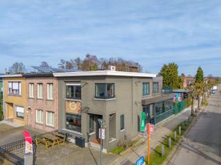 Gunstig gelegen opbrengsteigendom met een oppervlakte van ca. 96m². Op verdieping 1 is er nog een ruim appartement met terrasRuime tuin/terras met...