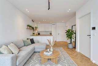 Dit lichtrijke 1-slaapkamer appartement van 56 m² is de ideale basis om volledig naar eigen smaak in te richten met als grote troef een...