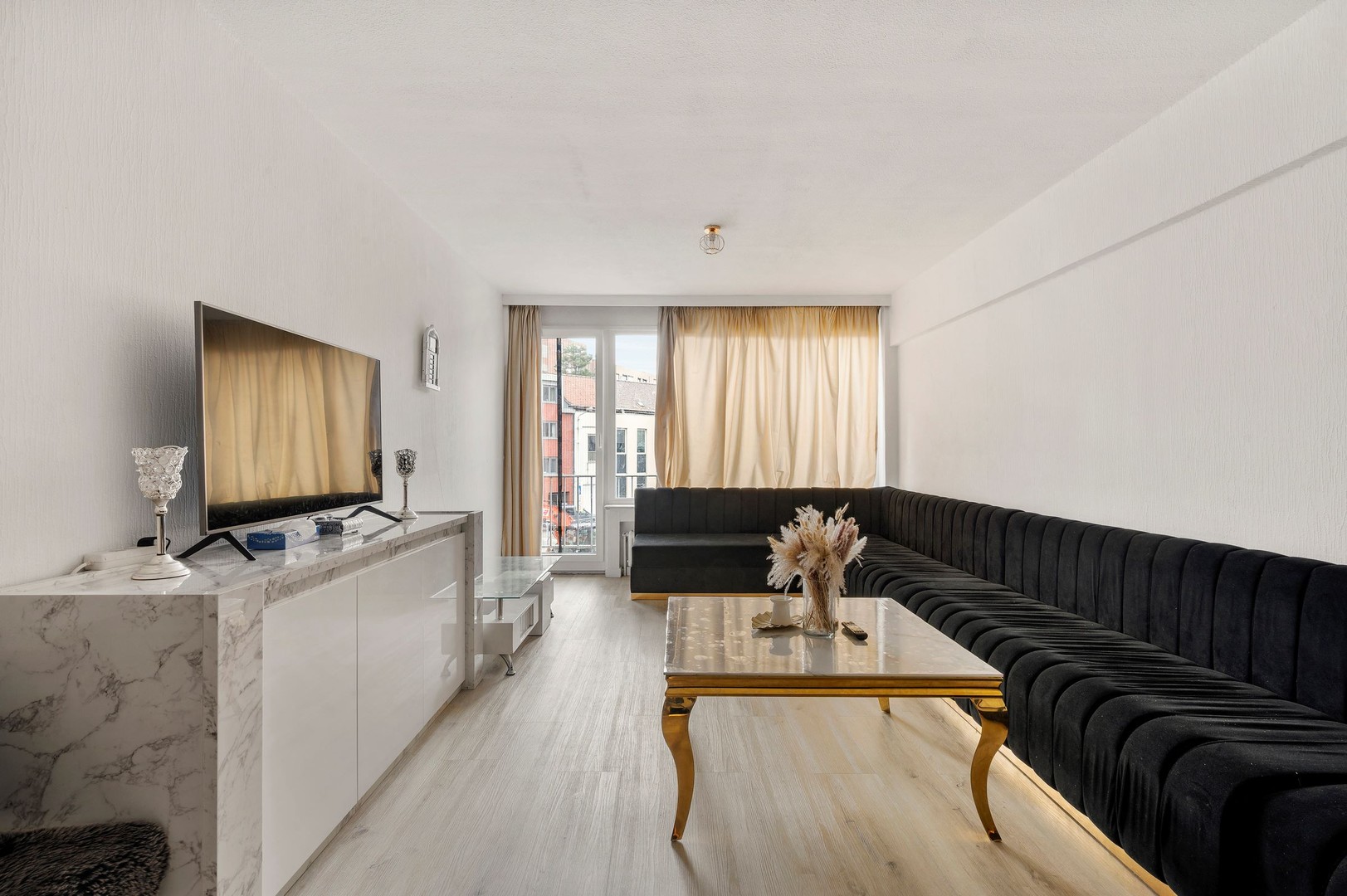 Energiezuinig en gezellig verhuurd appartement met 2 slaapkamers en balkon achteraan nabij het station van Kortrijk - foto 3