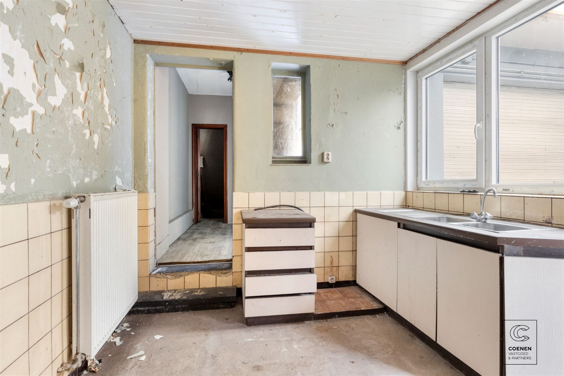 Te renoveren app. met handelsruimte op een gunstige locatie! - foto 4