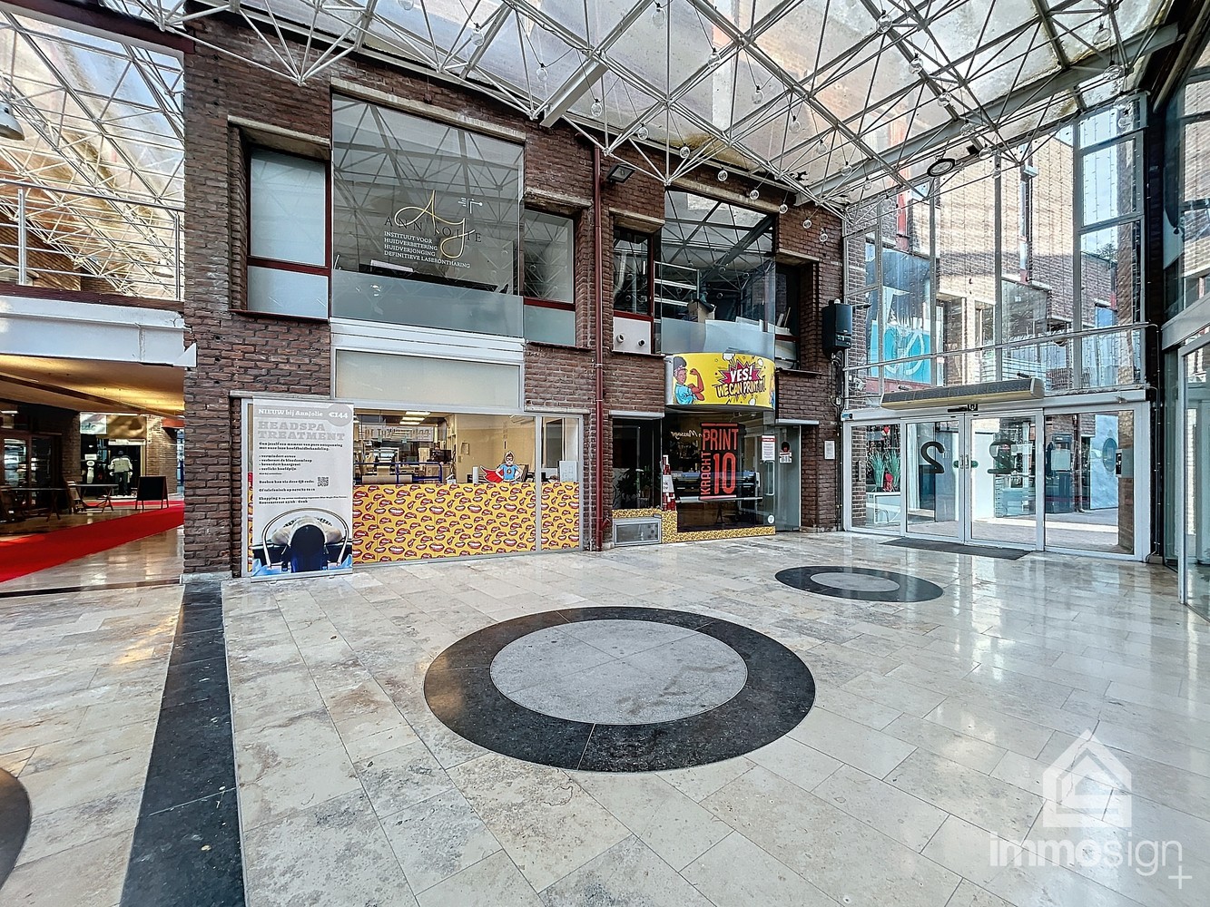 Zeer ruime handelsruimte met garage en autostaanplaats, mogelijks ook uit te breiden in Shopping 2 te Genk! - foto 2