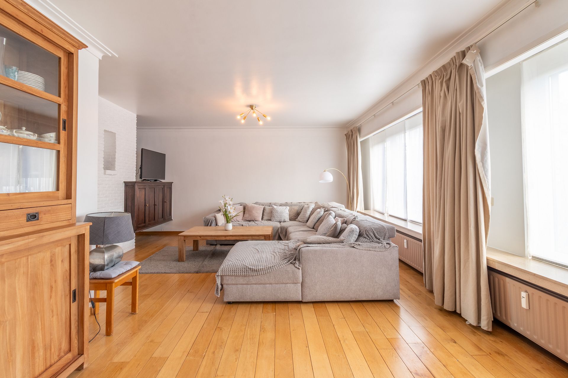 Een exclusief ruim duplex appartement met tuin en garagebox - foto 5