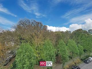 <p><span>Welcome to this magnificent penthouse, where modern finishes, light and a thoughtful layout come together to create exceptional living comfort.Ideal for couples, families or professionals looking for space, quality and a practical location close to Brussels.</span></p><p><span>Layout and Living spaces</span></p><p><span>Upon entering, you immediately experience the spacious and open atmosphere. The bright living room, finished with easy-care tile flooring, enjoys large windows and sash windows that not only bring in abundant natural light, but also provide a beautiful view of the environments park. This open living space seamlessly connects to the modern and equipped kitchen with spacious worktop and functional cabinetry .</span></p><p><span>Bedrooms</span></p><p><span>The apartment features two comfortable and well-situated bedrooms. Both rooms have large windows making them both practical and stylish. Both bedrooms offers direct access to the terrace through a sliding window. The second room is also spacious, bright and perfectly suited as a bedroom, home office or guest room.</span></p><p><span>Bathroom</span></p><p><span>The bathroom is modern and practical with both a bathtub and shower stall, double sinks, quality sanitary ware and smart storage options. </span></p><p><span>Terrace – A Unique Trump</span></p><p><span>One of the absolute highlights of this apartment is the exceptional terrace of approximately 53 m², and 8m²This terrace is accessible from several rooms and feels like a natural extension of the living space. It offers every opportunity for relaxation, outdoor meals, planting, or simply enjoying fresh air and open views.</span></p><p><span>Location and accessibility</span></p><p><span>Located in a lively and dynamic neighborhood, the apartment enjoys excellent connections towards the center of Brussels. Stores, restaurants, schools and public transportation are within walking distance. The neighborhood is known for its diversity, accessibility and urban amenities — ideal for those who love modern city living with all comforts at their fingertips.</span></p><p><span>Possibility to purchase very spacious garage box at €35,000.</span></p><p><span>A visit will certainly convince you — welcome to your future home in Sint-Jans-Molenbeek.</span></p><p><span> </span></p>