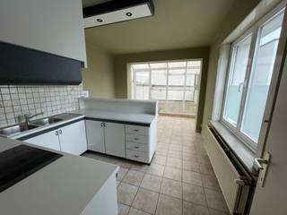 Duplex apartment : stairs to first floor - entrance - living room - dining area - equipped kitchen - spacious terrace - 2 bedrooms - bathroom...