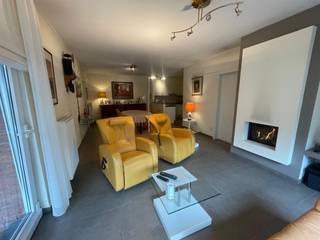 Erg aantrekkelijk, aangenaam en perfect onderhouden gelijkvloers 2-slaapkamerappartement met groot terras, tuintje, ondergrondse garage en kelder,...