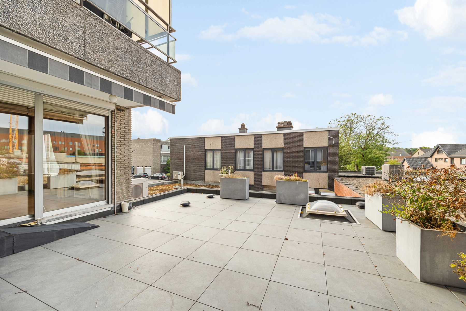 Ruim hoekappartement met groot terras in centrum Beveren - foto 5